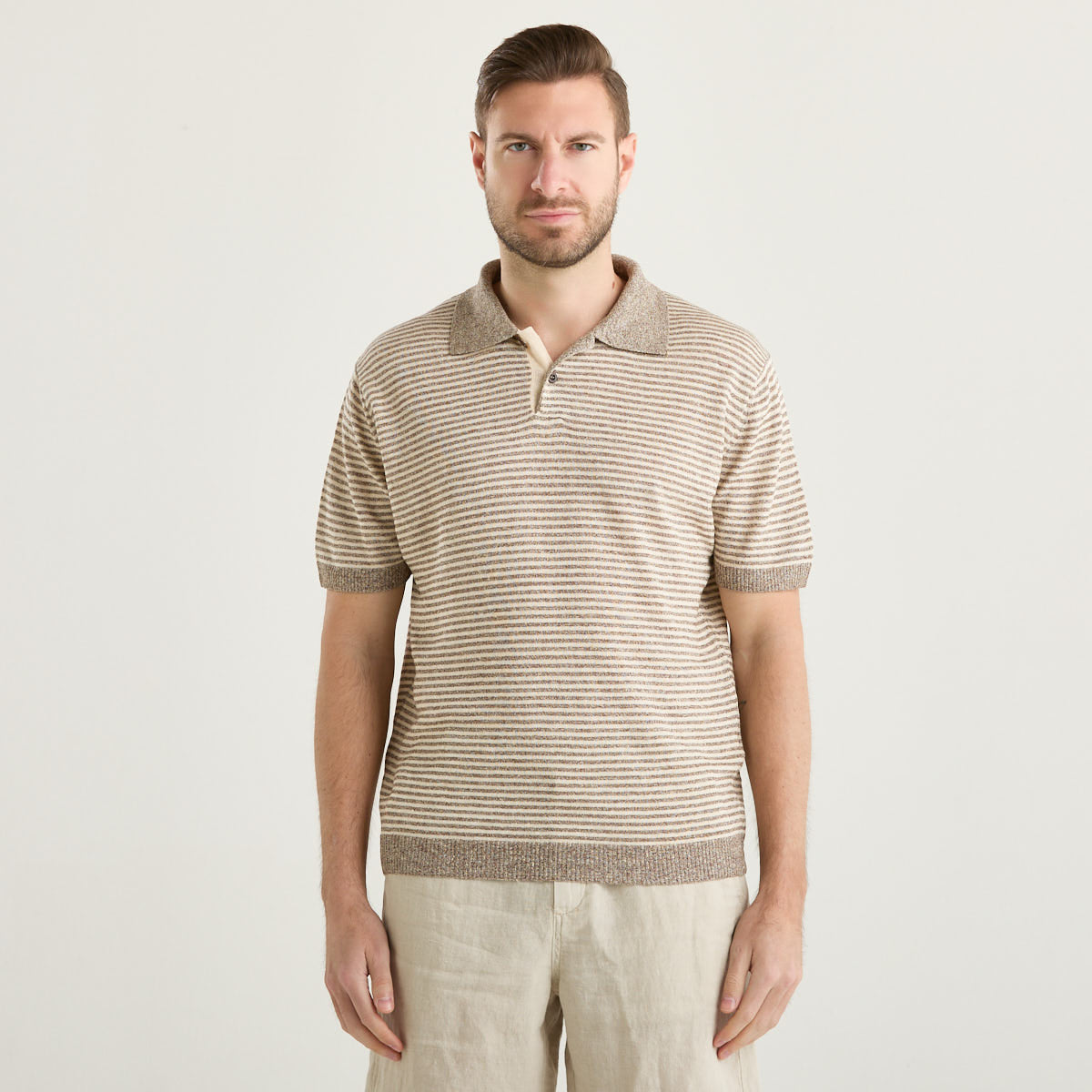 Wool & Co polo in tessuto a righe beige