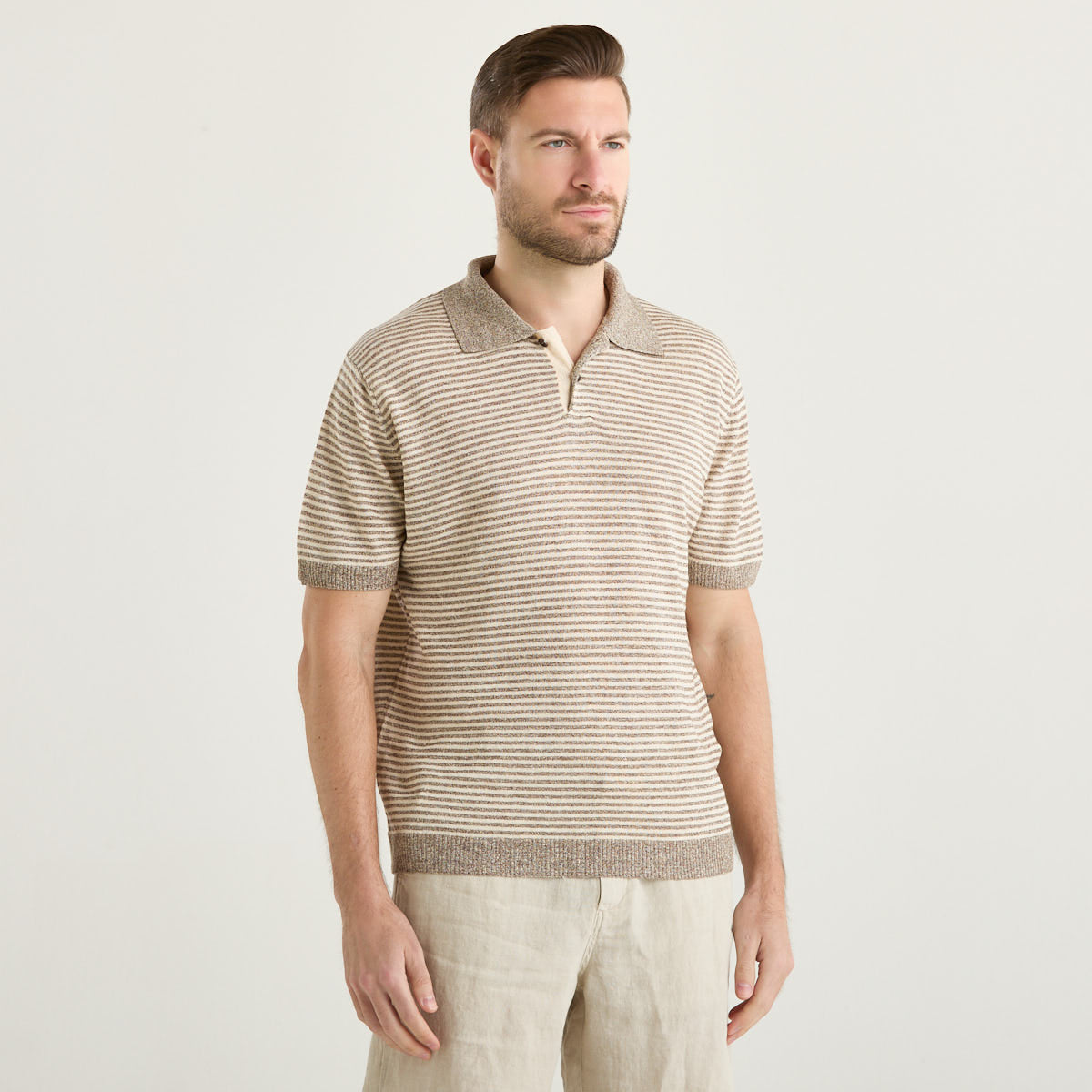 Wool & Co polo in tessuto a righe beige